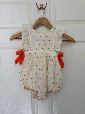 Pink Chicken Cream Bubble Romper with Orange Bow Accents
